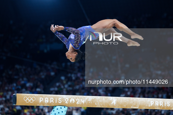 Simone Biles of Team United States competes on the balance beam during the Artistic Gymnastics Women's All-Around Final on day six of the Ol...