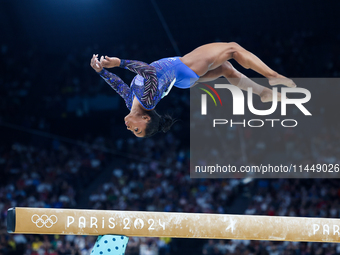 Simone Biles of Team United States competes on the balance beam during the Artistic Gymnastics Women's All-Around Final on day six of the Ol...