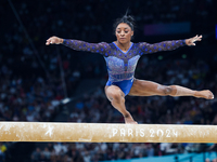 Simone Biles of Team United States competes on the balance beam during the Artistic Gymnastics Women's All-Around Final on day six of the Ol...