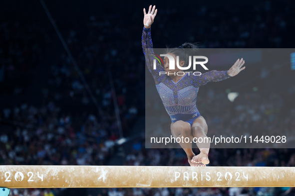 Simone Biles of Team United States competes on the balance beam during the Artistic Gymnastics Women's All-Around Final on day six of the Ol...