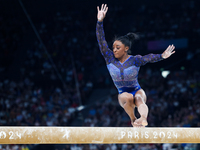 Simone Biles of Team United States competes on the balance beam during the Artistic Gymnastics Women's All-Around Final on day six of the Ol...