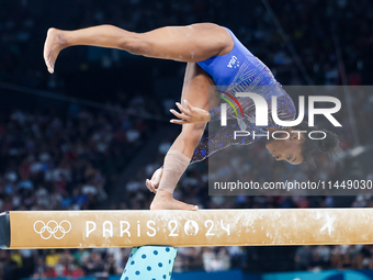 Simone Biles of Team United States competes on the balance beam during the Artistic Gymnastics Women's All-Around Final on day six of the Ol...