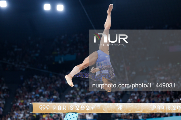 Simone Biles of Team United States competes on the balance beam during the Artistic Gymnastics Women's All-Around Final on day six of the Ol...