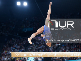 Simone Biles of Team United States competes on the balance beam during the Artistic Gymnastics Women's All-Around Final on day six of the Ol...