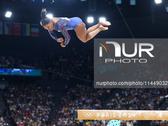 Simone Biles of Team United States competes on the balance beam during the Artistic Gymnastics Women's All-Around Final on day six of the Ol...