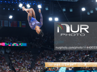 Simone Biles of Team United States competes on the balance beam during the Artistic Gymnastics Women's All-Around Final on day six of the Ol...