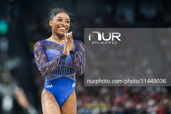 Simone Biles of Team United States competes on the balance beam during the Artistic Gymnastics Women's All-Around Final on day six of the Ol...