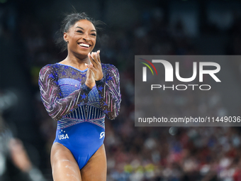 Simone Biles of Team United States competes on the balance beam during the Artistic Gymnastics Women's All-Around Final on day six of the Ol...