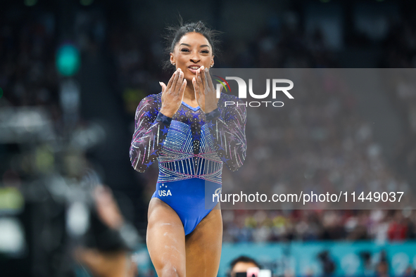 Simone Biles of Team United States competes on the balance beam during the Artistic Gymnastics Women's All-Around Final on day six of the Ol...