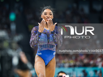 Simone Biles of Team United States competes on the balance beam during the Artistic Gymnastics Women's All-Around Final on day six of the Ol...