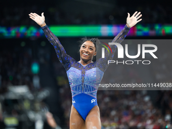 Simone Biles of Team United States competes on the balance beam during the Artistic Gymnastics Women's All-Around Final on day six of the Ol...