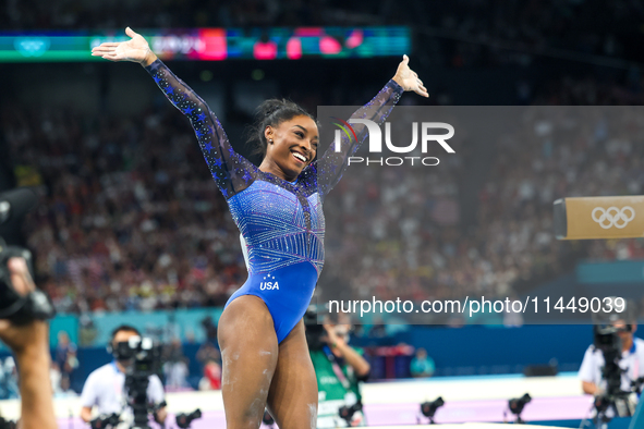 Simone Biles of Team United States competes on the balance beam during the Artistic Gymnastics Women's All-Around Final on day six of the Ol...