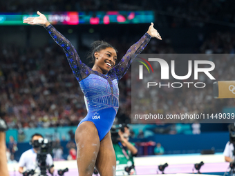 Simone Biles of Team United States competes on the balance beam during the Artistic Gymnastics Women's All-Around Final on day six of the Ol...