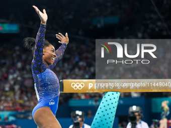 Simone Biles of Team United States competes on the balance beam during the Artistic Gymnastics Women's All-Around Final on day six of the Ol...