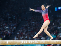 Sunisa Lee of Team United States competes on the balance beam during the Artistic Gymnastics Women's All-Around Final on day six of the Olym...