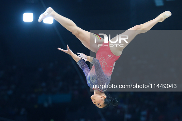 Sunisa Lee of Team United States competes on the balance beam during the Artistic Gymnastics Women's All-Around Final on day six of the Olym...