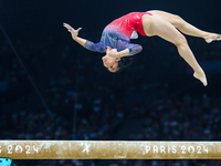 Sunisa Lee of Team United States competes on the balance beam during the Artistic Gymnastics Women's All-Around Final on day six of the Olym...