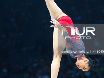 Sunisa Lee of Team United States competes on the balance beam during the Artistic Gymnastics Women's All-Around Final on day six of the Olym...