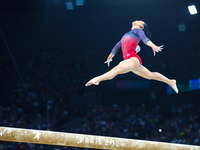 Sunisa Lee of Team United States competes on the balance beam during the Artistic Gymnastics Women's All-Around Final on day six of the Olym...