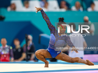 Simone Biles of Team United States  competes in the floor exercise during   the Artistic Gymnastics Women's All-Around Final on day six of t...