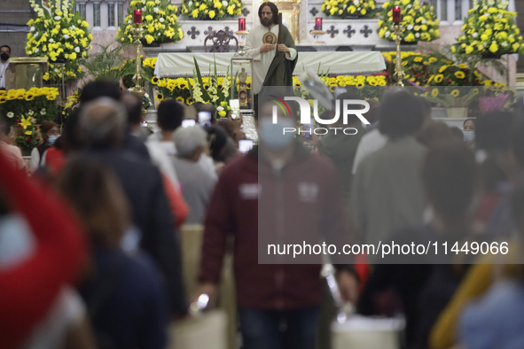 Dozens of people are attending the Church of San Hipolito in Mexico City, Mexico, on August 1, 2024 to see the relics of Saint Jude Thaddeus...