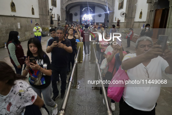 Dozens of people are attending the Church of San Hipolito in Mexico City, Mexico, on August 1, 2024 to see the relics of Saint Jude Thaddeus...