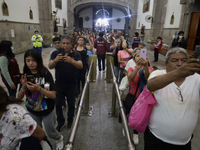 Dozens of people are attending the Church of San Hipolito in Mexico City, Mexico, on August 1, 2024 to see the relics of Saint Jude Thaddeus...