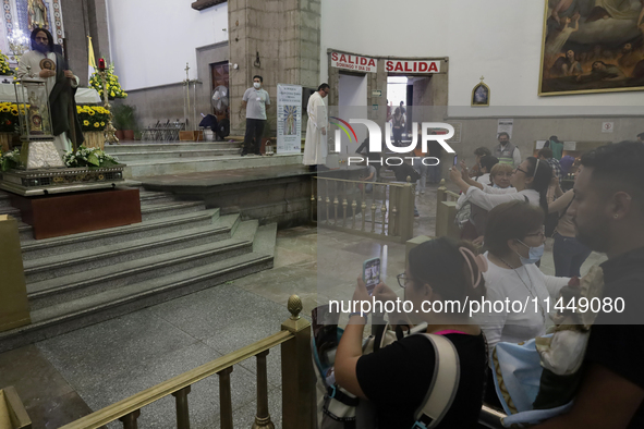 Dozens of people are attending the Church of San Hipolito in Mexico City, Mexico, on August 1, 2024 to see the relics of Saint Jude Thaddeus...