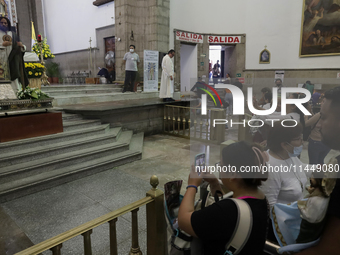 Dozens of people are attending the Church of San Hipolito in Mexico City, Mexico, on August 1, 2024 to see the relics of Saint Jude Thaddeus...