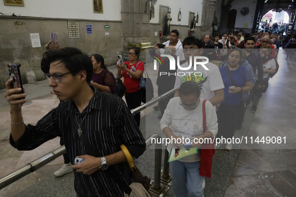 Dozens of people are attending the Church of San Hipolito in Mexico City, Mexico, on August 1, 2024 to see the relics of Saint Jude Thaddeus...