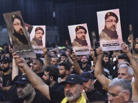 Hezbollah fighters and mourners are attending the funeral ceremony of slain top commander Fuad Shukr in Beirut's southern suburbs, on August...