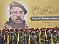 Hezbollah fighters and mourners are attending the funeral ceremony of slain top commander Fuad Shukr in Beirut's southern suburbs, on August...