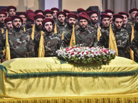 Hezbollah fighters and mourners are attending the funeral ceremony of slain top commander Fuad Shukr in Beirut's southern suburbs, on August...