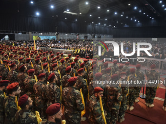 Hezbollah fighters and mourners are attending the funeral ceremony of slain top commander Fuad Shukr in Beirut's southern suburbs, on August...