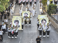 Hezbollah fighters and mourners are attending the funeral ceremony of slain top commander Fuad Shukr in Beirut's southern suburbs, on August...