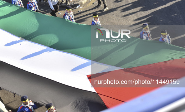 Hezbollah fighters and mourners are attending the funeral ceremony of slain top commander Fuad Shukr in Beirut's southern suburbs, on August...