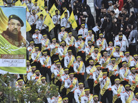 Hezbollah fighters and mourners are attending the funeral ceremony of slain top commander Fuad Shukr in Beirut's southern suburbs, on August...