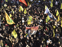 Hezbollah fighters and mourners are attending the funeral ceremony of slain top commander Fuad Shukr in Beirut's southern suburbs, on August...