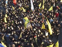 Hezbollah fighters and mourners are attending the funeral ceremony of slain top commander Fuad Shukr in Beirut's southern suburbs, on August...