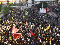 Hezbollah fighters and mourners are attending the funeral ceremony of slain top commander Fuad Shukr in Beirut's southern suburbs, on August...