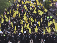 Hezbollah fighters and mourners are attending the funeral ceremony of slain top commander Fuad Shukr in Beirut's southern suburbs, on August...