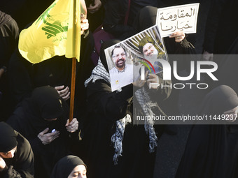 Hezbollah fighters and mourners are attending the funeral ceremony of slain top commander Fuad Shukr in Beirut's southern suburbs, on August...