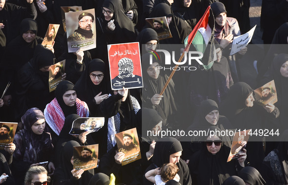 Hezbollah fighters and mourners are attending the funeral ceremony of slain top commander Fuad Shukr in Beirut's southern suburbs, on August...