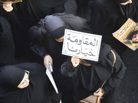 Hezbollah fighters and mourners are attending the funeral ceremony of slain top commander Fuad Shukr in Beirut's southern suburbs, on August...