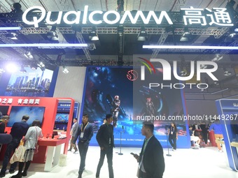 Visitors are visiting the stand of Qualcomm at the 2023 CIIE in Shanghai, China, on November 6, 2023. (