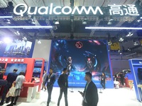 Visitors are visiting the stand of Qualcomm at the 2023 CIIE in Shanghai, China, on November 6, 2023. (