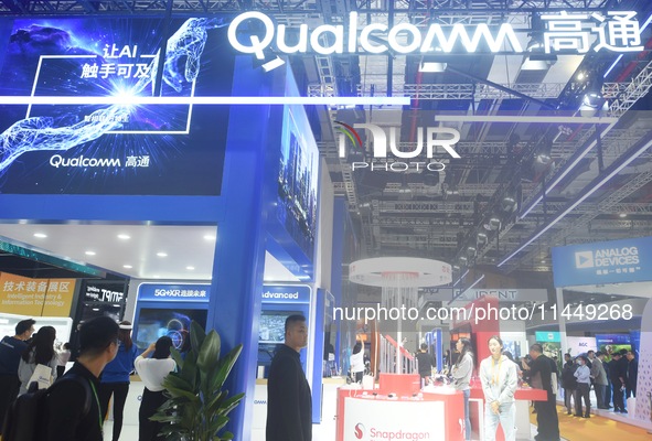 Visitors are visiting the stand of Qualcomm at the 2023 CIIE in Shanghai, China, on November 6, 2023. 