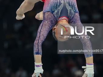 Sunia Lee of United States performing on the Uneven Bars during  the Artistic Gymnastics Women's All-Around Final on day six of the Olympic...