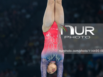 Sunia Lee of United States performing on the Uneven Bars during  the Artistic Gymnastics Women's All-Around Final on day six of the Olympic...