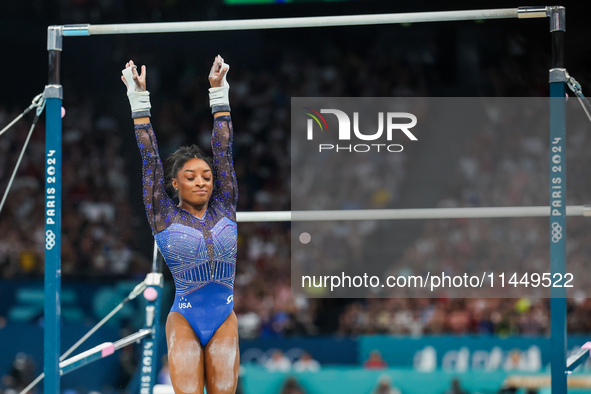 Simone Biles of United States performing on the Uneven Bars during  the Artistic Gymnastics Women's All-Around Final on day six of the Olymp...